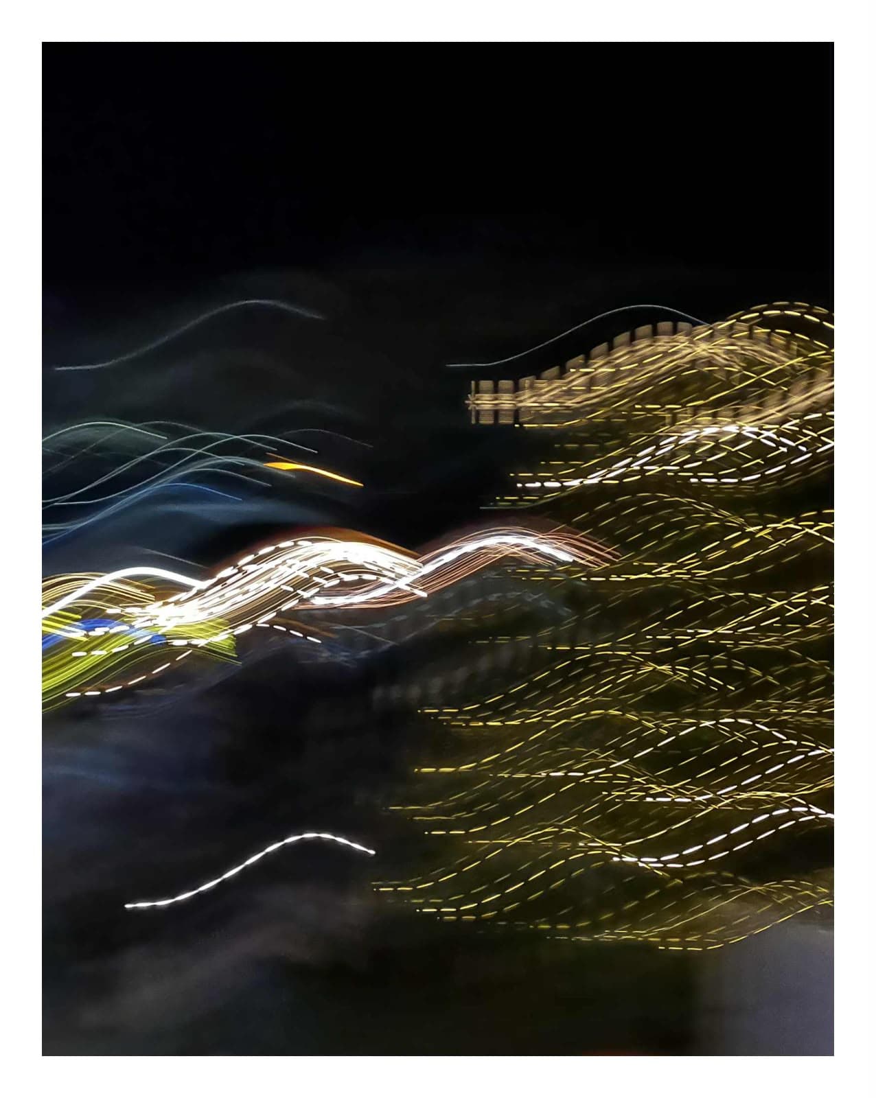 Abstract light trails fine art photograph at night by Andrea Polmüller